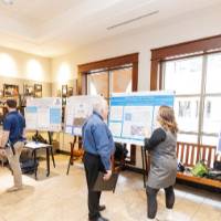 Aruna in the background